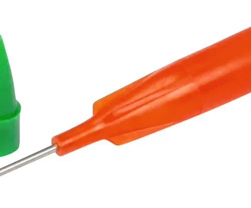 Spisser oransje med nål